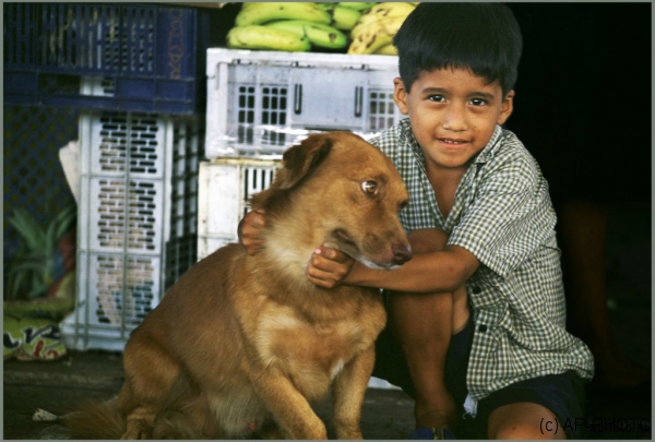 Boy with his dog, Ecuador