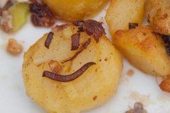 Home fries with piece of onion